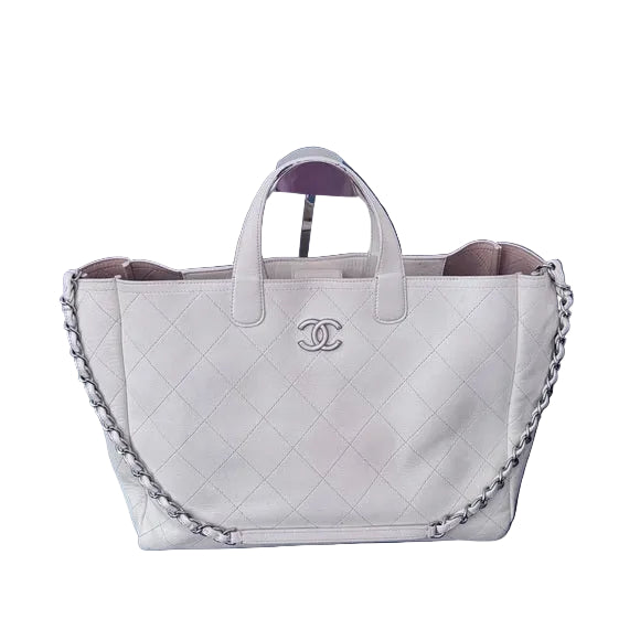 Bolsa Chanel Caviar Stitched Large Shopping Tote Off White