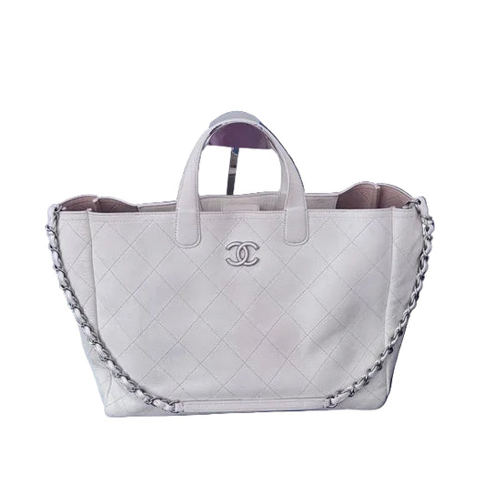 Bolsa Chanel Caviar Stitched Large Shopping Tote Off White