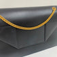 Bolsa Saint Laurent Betty Preta e Dourado