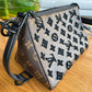 Bolsa Louis Vuitton Monogram Tuffetage Triangle Marrom