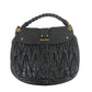 Bolsa Miu Miu Matelassé Coffer Hobo Preta
