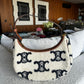 Bolsa Cèline Triomphe Pelúcia