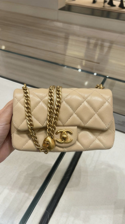 Bolsa Chanel Lambskin CC Pearl Crush Flap Bege